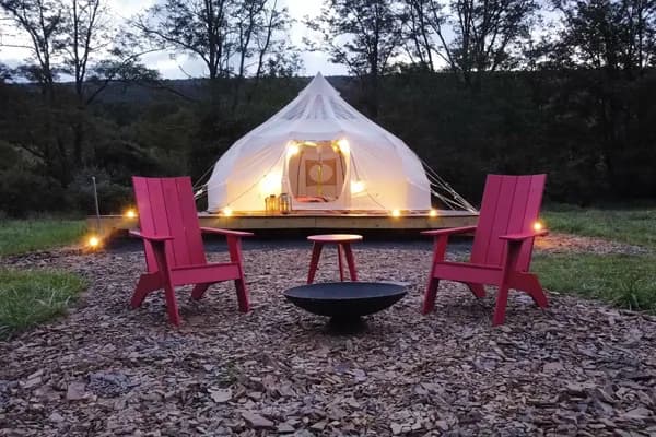 Glamping yurt with fire pit at River Mountain