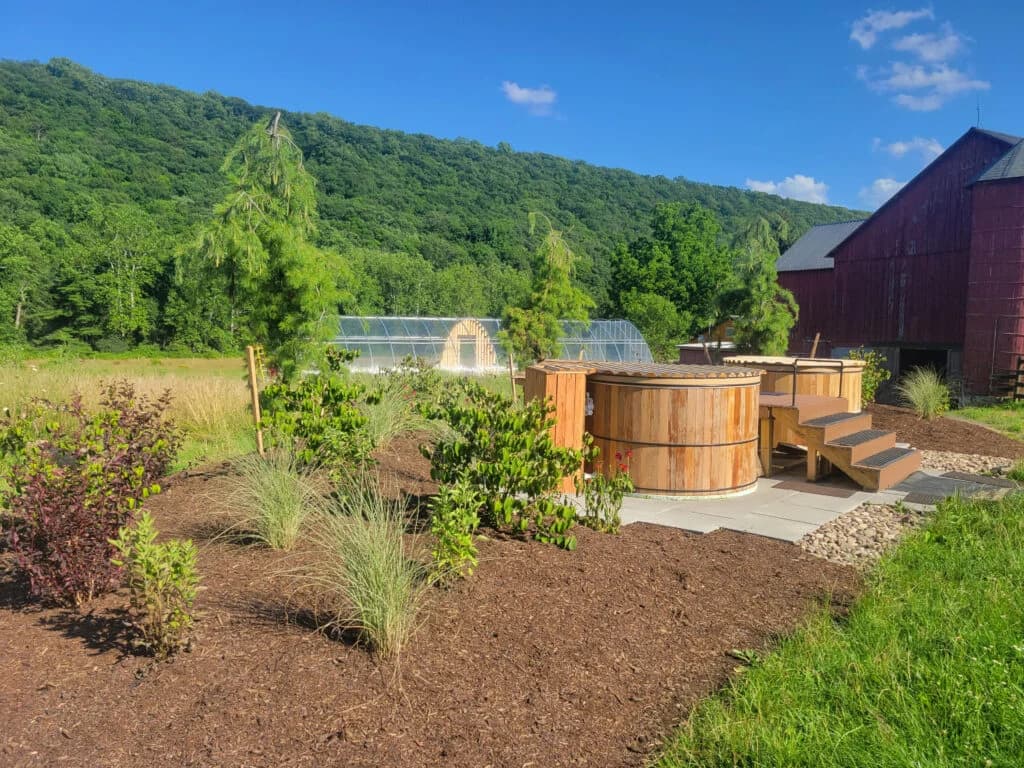 Greenhouse and outdoor hot tub at River Mountain