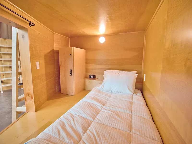 Single bed inside a glamping pod