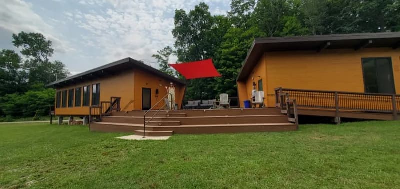 Shared outdoor space between the glamping pod cabins