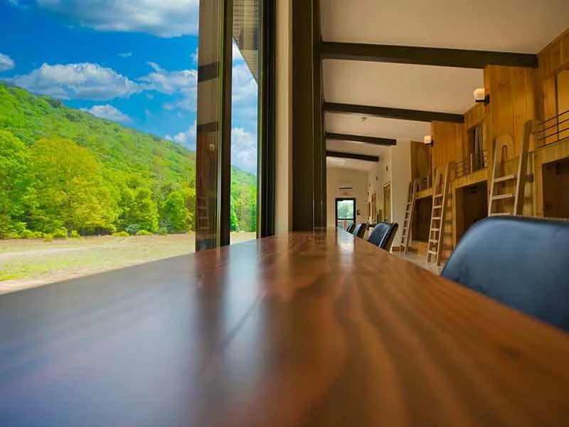Communal workspace with mountain views near the glamping pods