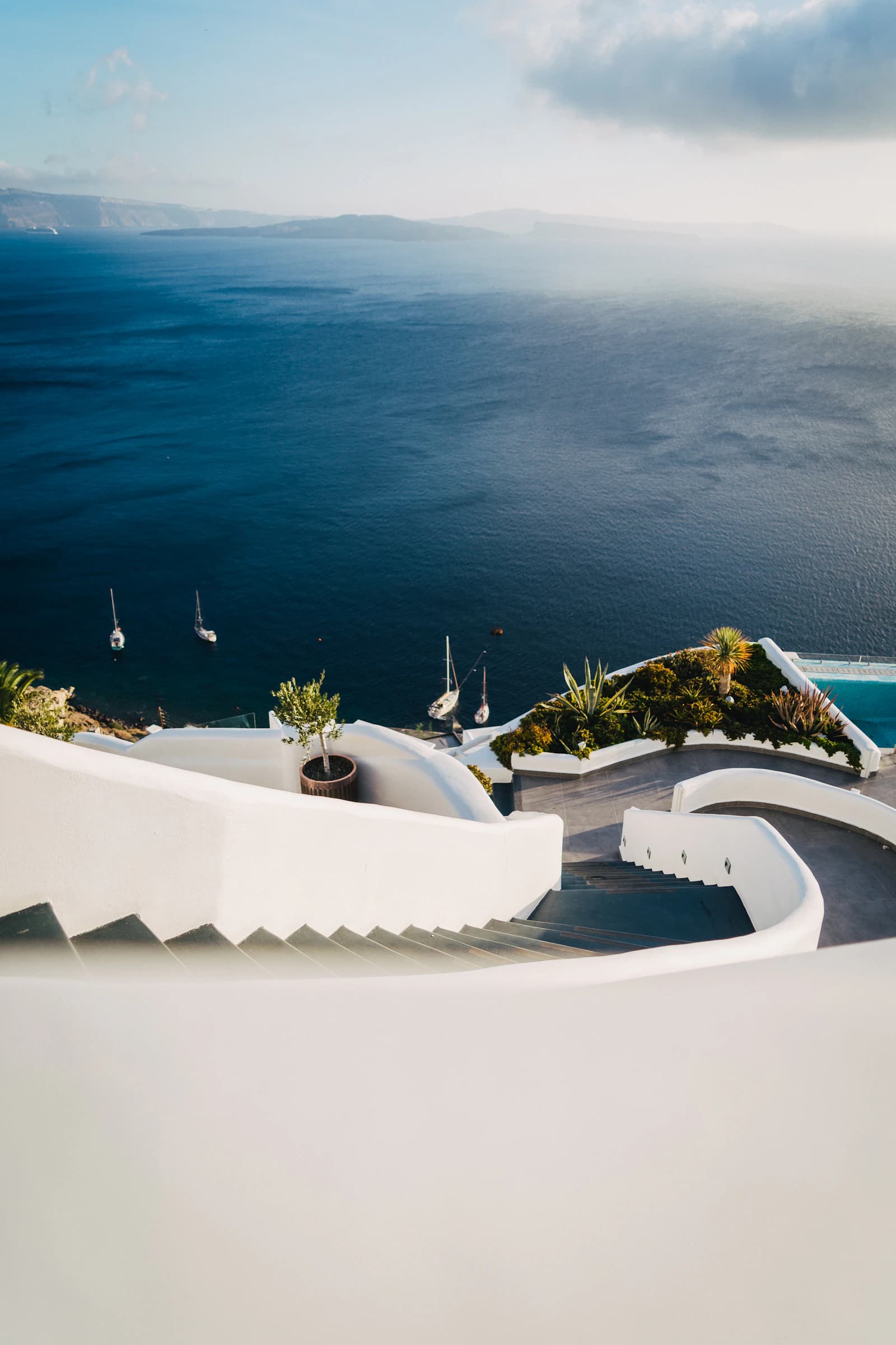 Whitewashed steps overlooking the sea in Santorini, Greece