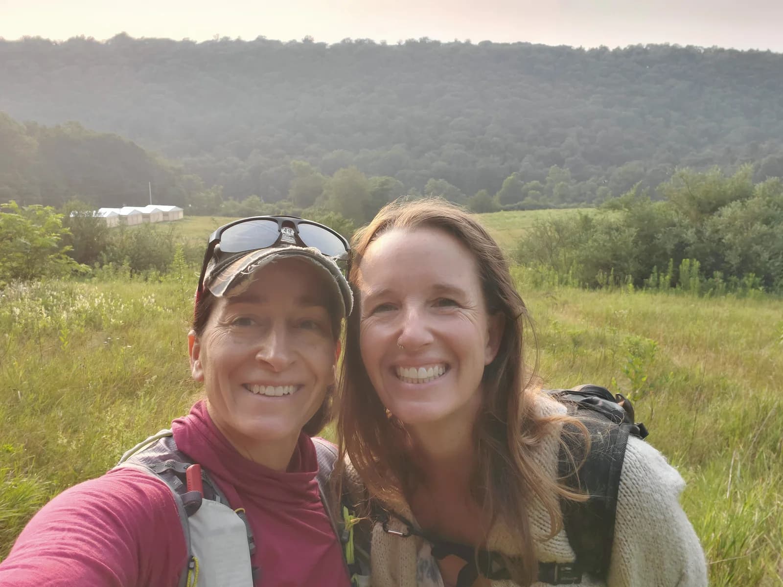 Jenn and Jill on a morning hike above the retreat valley